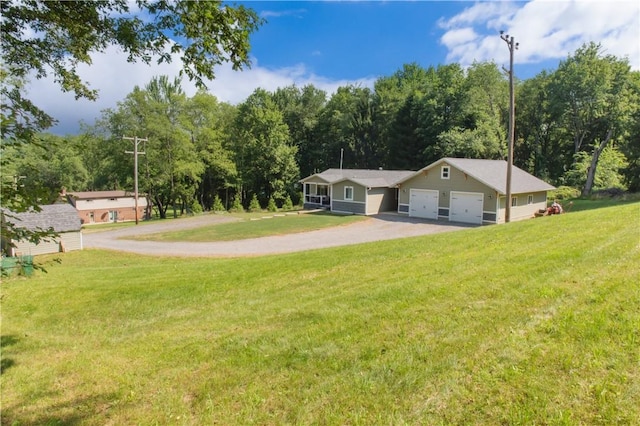 113 Betty Ln, Butler, PA 16002 - view of green lawn with an attached garage and driveway