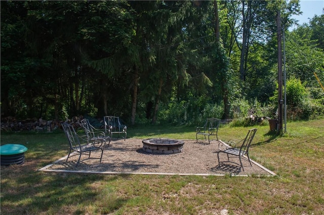113 Betty Ln, Butler, PA 16002 - view of grassy yard with a fire pit