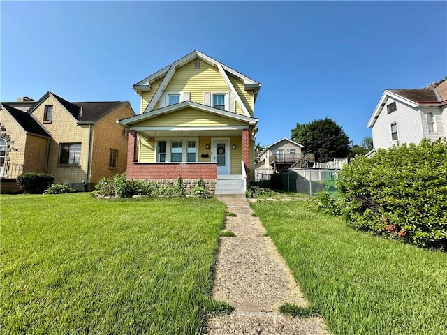 1804 Ridge Ave, Coraopolis, PA 15108 - colonial inspired home with a gambrel roof, covered porch, and brick siding