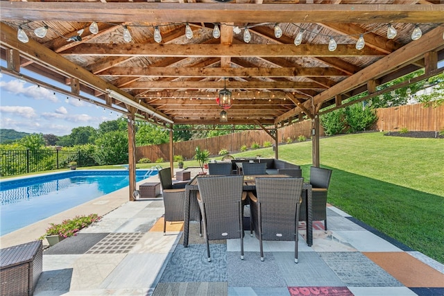 219 Tea Rose Ln, Harrison Twp, PA 15065 - fenced backyard with a patio area and outdoor dining area