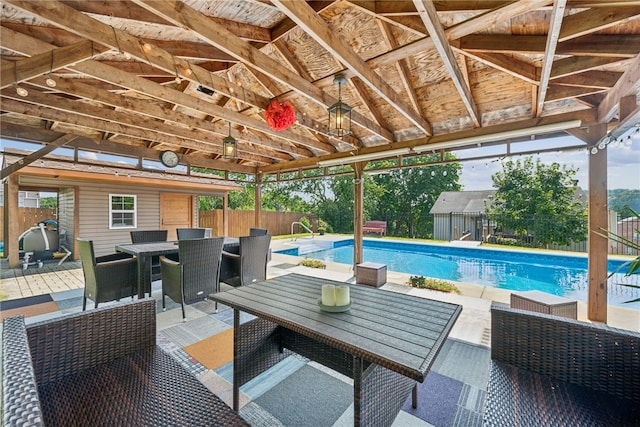 219 Tea Rose Ln, Harrison Twp, PA 15065 - view of swimming pool featuring outdoor dining area, a fenced backyard, and a patio