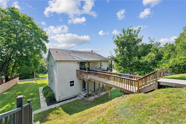 219 Tea Rose Ln, Harrison Twp, PA 15065 - back of property featuring a deck and a fenced backyard