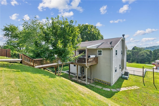 219 Tea Rose Ln, Harrison Twp, PA 15065 - rear view of house with a deck and a chimney