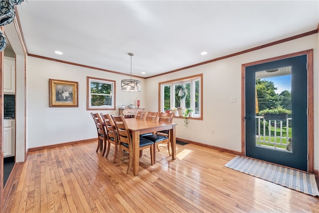 219 Tea Rose Ln, Harrison Twp, PA 15065 - dining space featuring plenty of natural light, crown molding, light wood-style floors, and recessed lighting