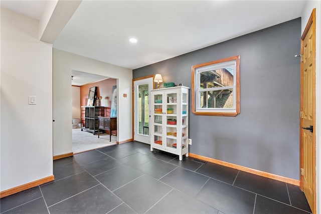 219 Tea Rose Ln, Harrison Twp, PA 15065 - hallway featuring recessed lighting and dark tile patterned floors
