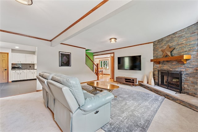 219 Tea Rose Ln, Harrison Twp, PA 15065 - living room featuring ornamental molding, a fireplace, stairs, and light colored carpet