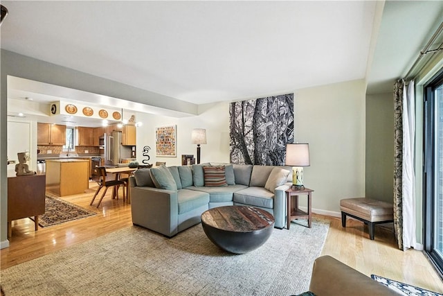 38 Foster Sq, Central North Side, PA 15212 - living room with light wood-type flooring and baseboards