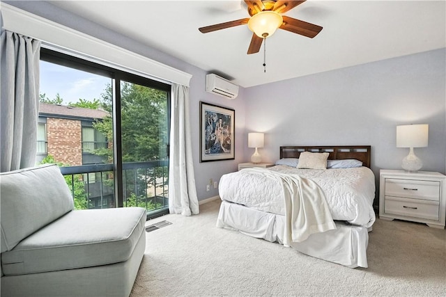 38 Foster Sq, Central North Side, PA 15212 - carpeted bedroom featuring a wall mounted air conditioner, access to exterior, and ceiling fan