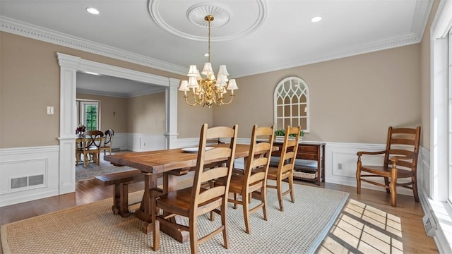 108 Trenton Cir, Peters Twp, PA 15317 - dining area featuring a wainscoted wall, ornamental molding, light wood-style floors, a chandelier, and recessed lighting