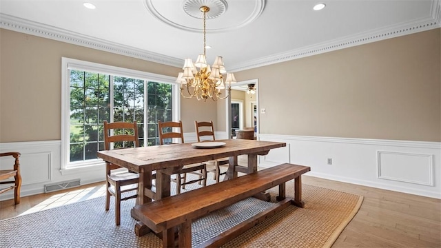 108 Trenton Cir, Peters Twp, PA 15317 - dining space with a chandelier, wainscoting, ornamental molding, light wood-style flooring, and recessed lighting
