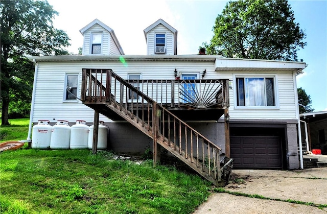 8263 Mentor Rd, Forward Twp, PA 15037 - rear view of property featuring an attached garage, stairs, driveway, a deck, and a yard