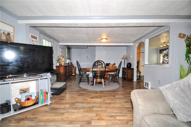 8263 Mentor Rd, Forward Twp, PA 15037 - dining area featuring arched walkways and wood finished floors