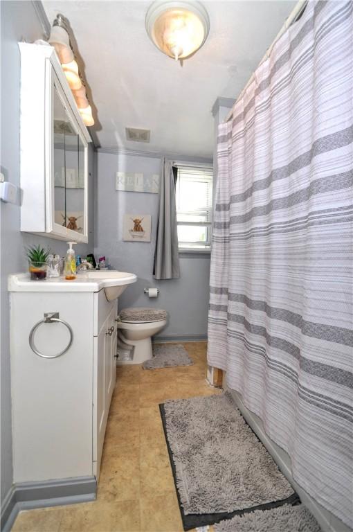 8263 Mentor Rd, Forward Twp, PA 15037 - bathroom with vanity and a shower with shower curtain
