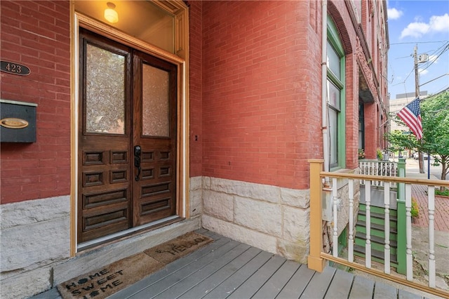 423 Lockhart St, East Allegheny, PA 15212 - doorway to property featuring brick siding