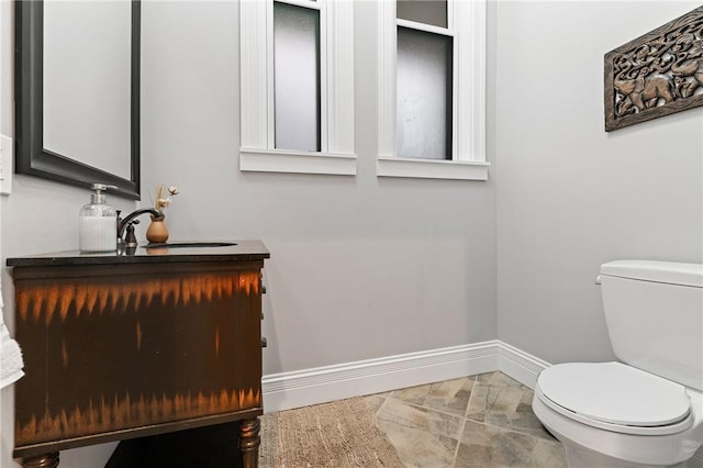 423 Lockhart St, East Allegheny, PA 15212 - half bathroom featuring vanity and marble finish flooring