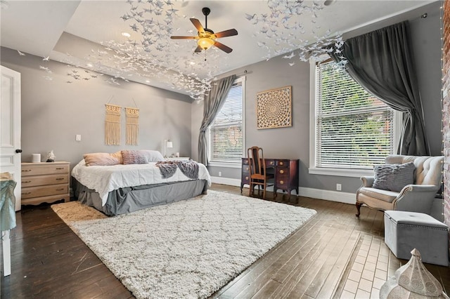 423 Lockhart St, East Allegheny, PA 15212 - bedroom with multiple windows, dark wood-style floors, and a ceiling fan