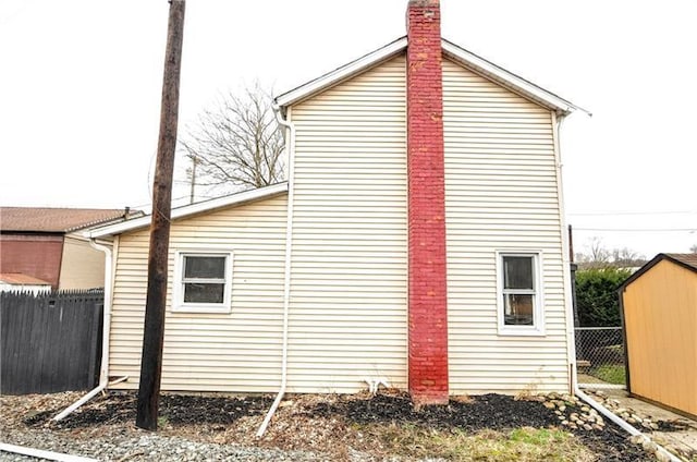 145 E Main St, Monongahela, PA 15063 - view of side of property with a storage shed and a chimney
