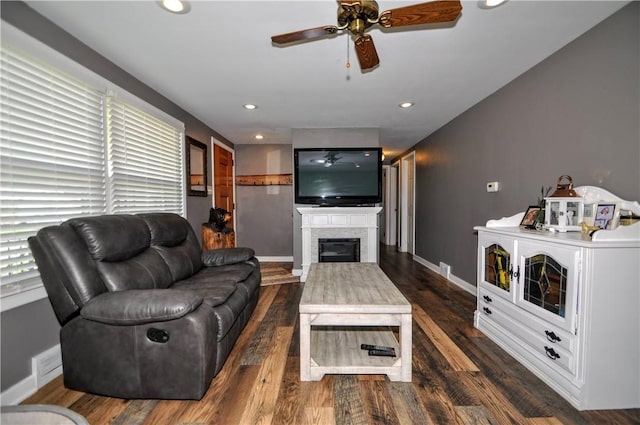 111 Wood St, Rostraver, PA 15089 - living area featuring ceiling fan, dark wood-type flooring, a glass covered fireplace, and recessed lighting