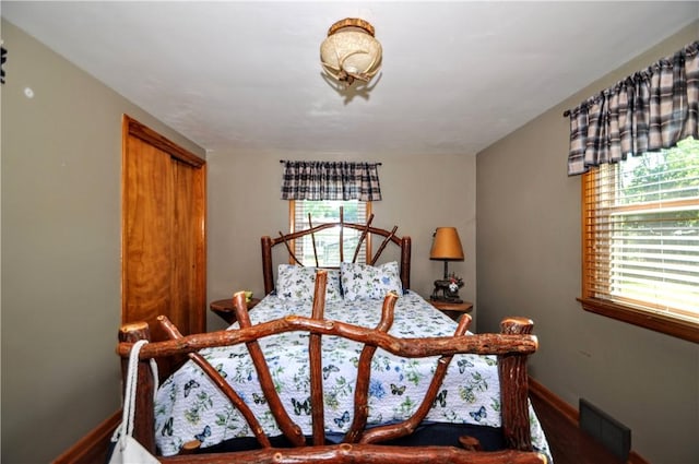 111 Wood St, Rostraver, PA 15089 - bedroom with wood finished floors and baseboards