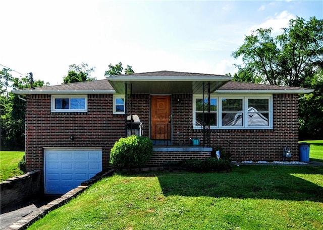 111 Wood St, Rostraver, PA 15089 - view of front of property featuring an attached garage, brick siding, and a front yard