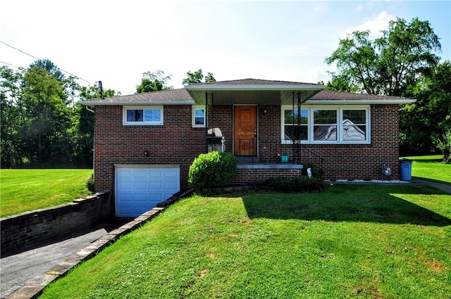 111 Wood St, Rostraver, PA 15089 - view of front of property featuring a garage, driveway, a front yard, and brick siding