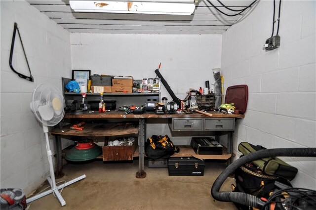 111 Wood St, Rostraver, PA 15089 - basement featuring a workshop area and concrete block wall