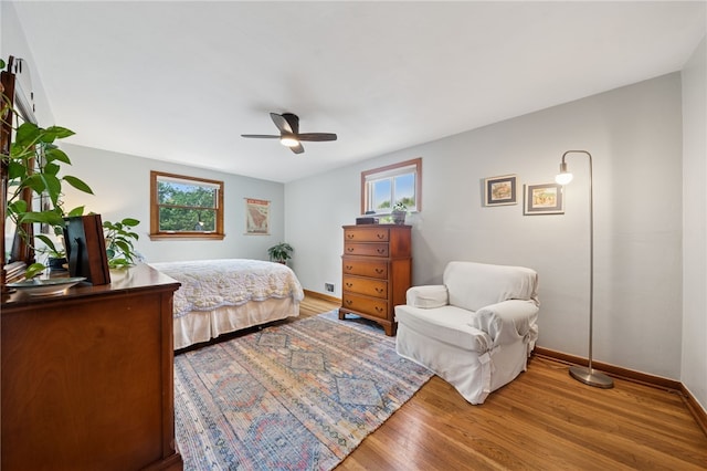 404 Atlantic Ave, Forest Hills Boro, PA 15221 - bedroom with multiple windows, wood finished floors, and ceiling fan