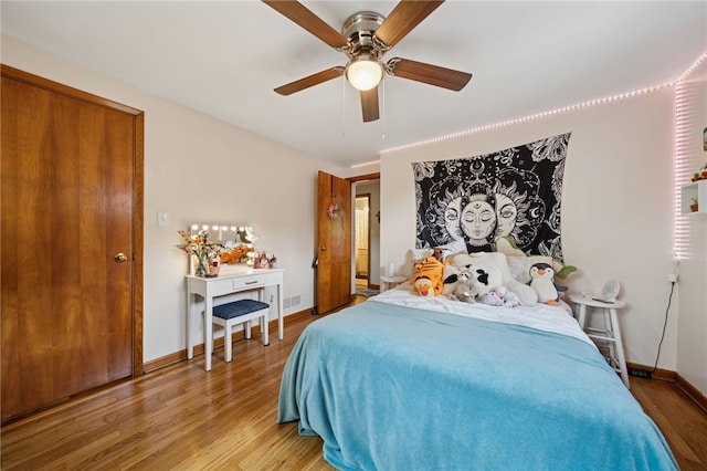 404 Atlantic Ave, Forest Hills Boro, PA 15221 - bedroom with wood finished floors and ceiling fan