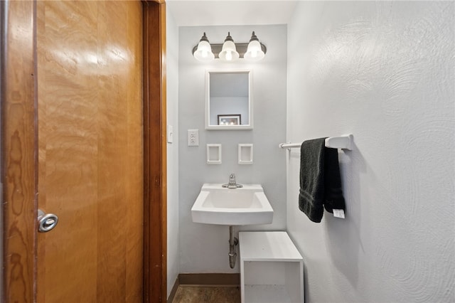 404 Atlantic Ave, Forest Hills Boro, PA 15221 - bathroom featuring a sink and baseboards