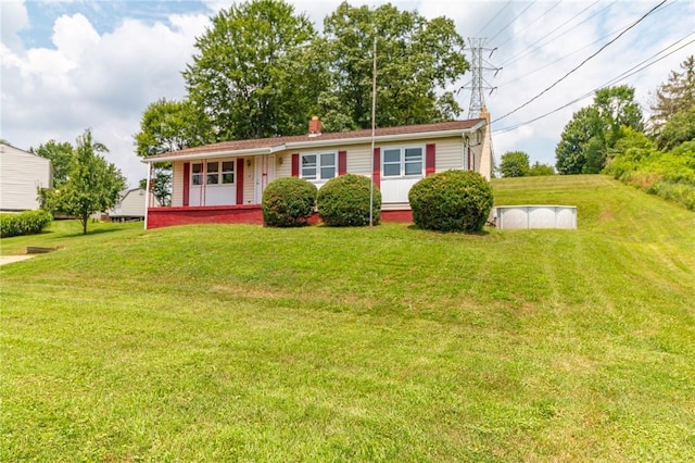 109 New Orchard Dr, Frazer, PA 15084 - ranch-style home with a front yard, a chimney, and covered porch