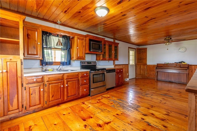 109 New Orchard Dr, Frazer, PA 15084 - kitchen with stainless steel appliances, a wainscoted wall, healthy amount of natural light, wooden ceiling, and light countertops
