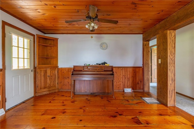 109 New Orchard Dr, Frazer, PA 15084 - home office with a wainscoted wall, wood ceiling, hardwood / wood-style flooring, wooden walls, and ceiling fan
