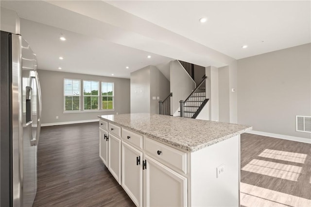 1008 Adair Ave, Middlesex Twp, PA 16059 - kitchen featuring stainless steel fridge, open floor plan, dark wood-style floors, white cabinets, and recessed lighting