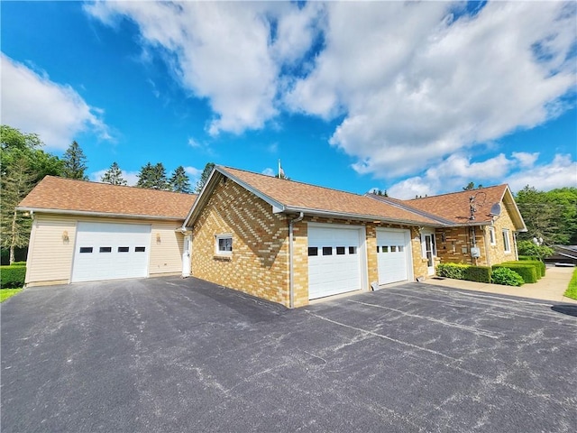 1031 Gameland Rd, Donegal, PA 16025 - view of home's exterior with brick siding and roof with shingles