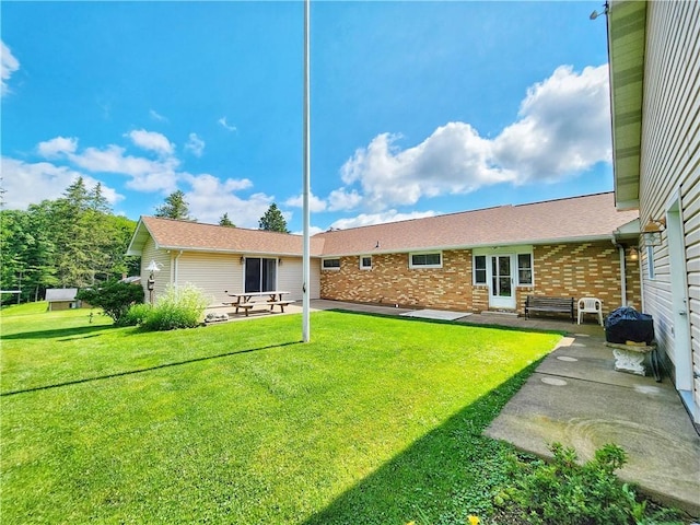 1031 Gameland Rd, Donegal, PA 16025 - view of green lawn with a patio