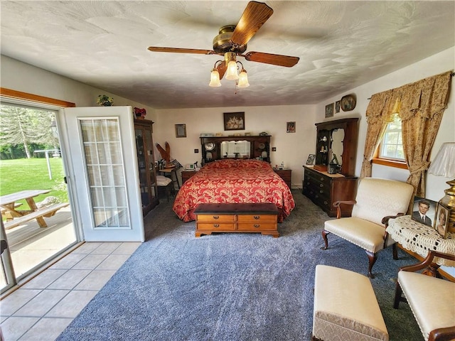 1031 Gameland Rd, Donegal, PA 16025 - bedroom with access to exterior, multiple windows, light tile patterned flooring, and ceiling fan