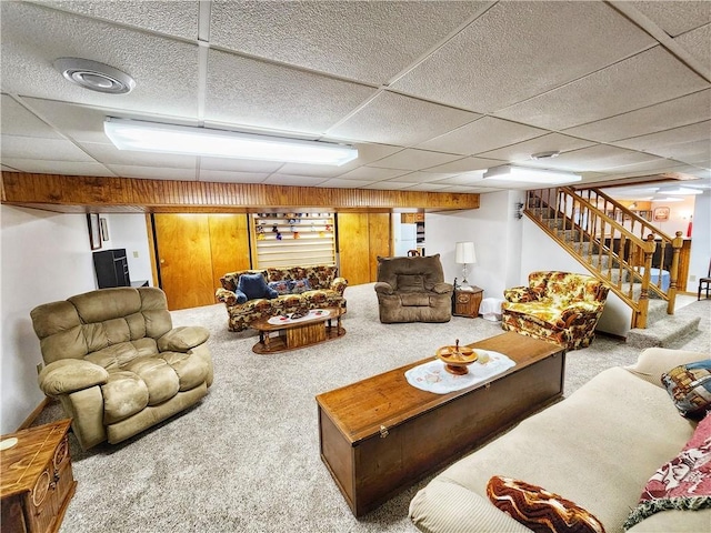 1031 Gameland Rd, Donegal, PA 16025 - living area featuring carpet floors, stairway, and a drop ceiling