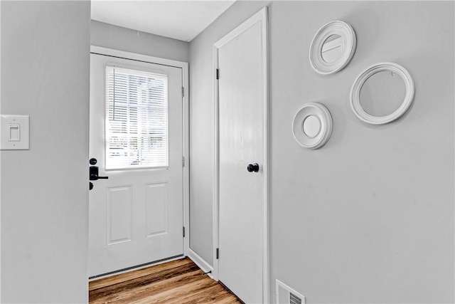 613 Newton Sq, Moon/Crescent Twp, PA 15108 - doorway to outside with wood finished floors