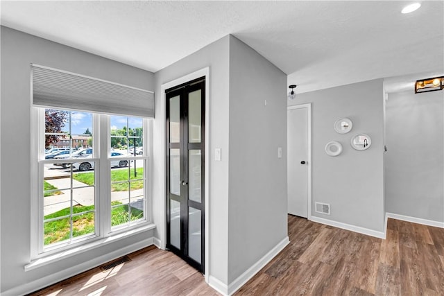 613 Newton Sq, Moon/Crescent Twp, PA 15108 - foyer featuring wood finished floors and baseboards