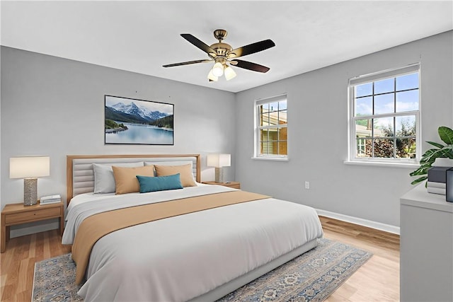 613 Newton Sq, Moon/Crescent Twp, PA 15108 - bedroom featuring light wood-style flooring and ceiling fan