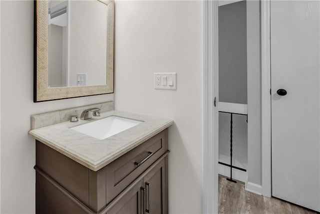 613 Newton Sq, Moon/Crescent Twp, PA 15108 - bathroom with vanity and wood finished floors