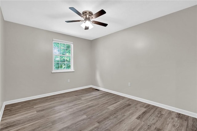 613 Newton Sq, Moon/Crescent Twp, PA 15108 - spare room with wood finished floors and a ceiling fan