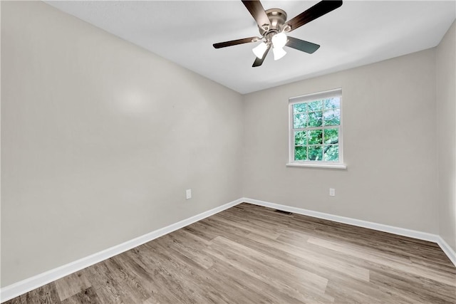 613 Newton Sq, Moon/Crescent Twp, PA 15108 - spare room with wood finished floors and a ceiling fan