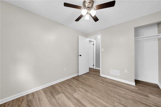 613 Newton Sq, Moon/Crescent Twp, PA 15108 - unfurnished bedroom with wood finished floors, a closet, and a ceiling fan