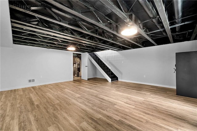 613 Newton Sq, Moon/Crescent Twp, PA 15108 - finished below grade area featuring stairway and wood finished floors