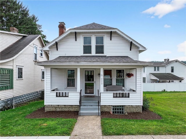 222 S 8th St, West Newton, PA 15089 - view of front of property with covered porch, a chimney, and roof with shingles