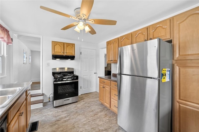 222 S 8th St, West Newton, PA 15089 - kitchen with stainless steel appliances, under cabinet range hood, and a ceiling fan
