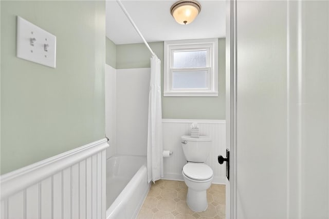 222 S 8th St, West Newton, PA 15089 - bathroom featuring wainscoting, shower / tub combo with curtain, and tile patterned floors