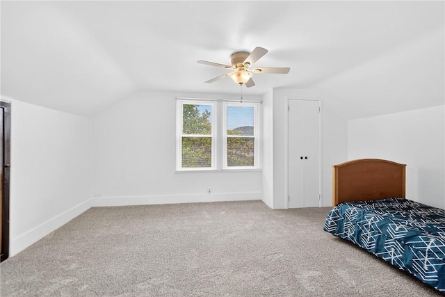 222 S 8th St, West Newton, PA 15089 - unfurnished bedroom featuring vaulted ceiling, carpet flooring, and ceiling fan