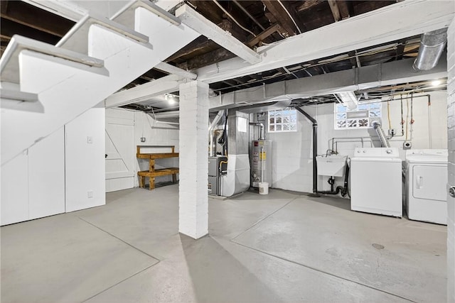 222 S 8th St, West Newton, PA 15089 - below grade area featuring gas water heater, washing machine and dryer, and heating unit